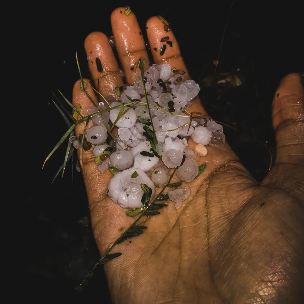 Hand with hail balls