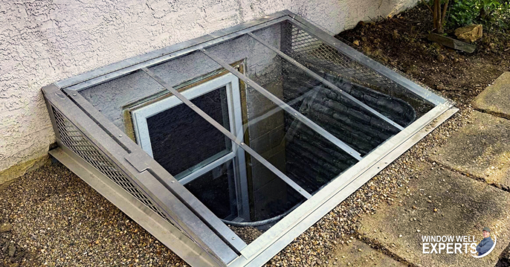 Sloped window well cover