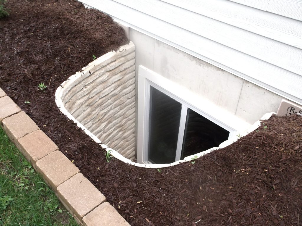 Plastic Composite Window Well installed