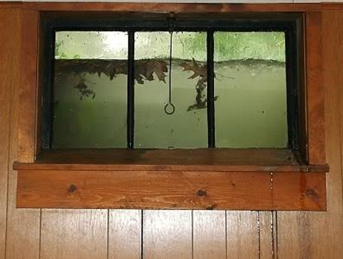 Flooded Window Wells - what to do? 1
