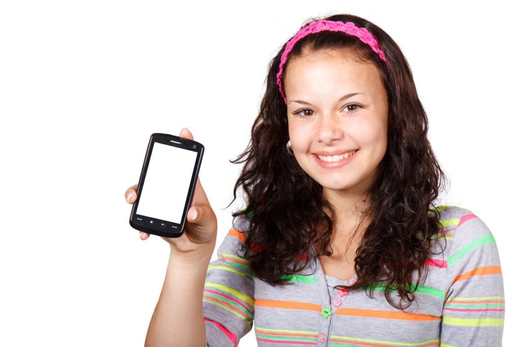 girl holding a phone