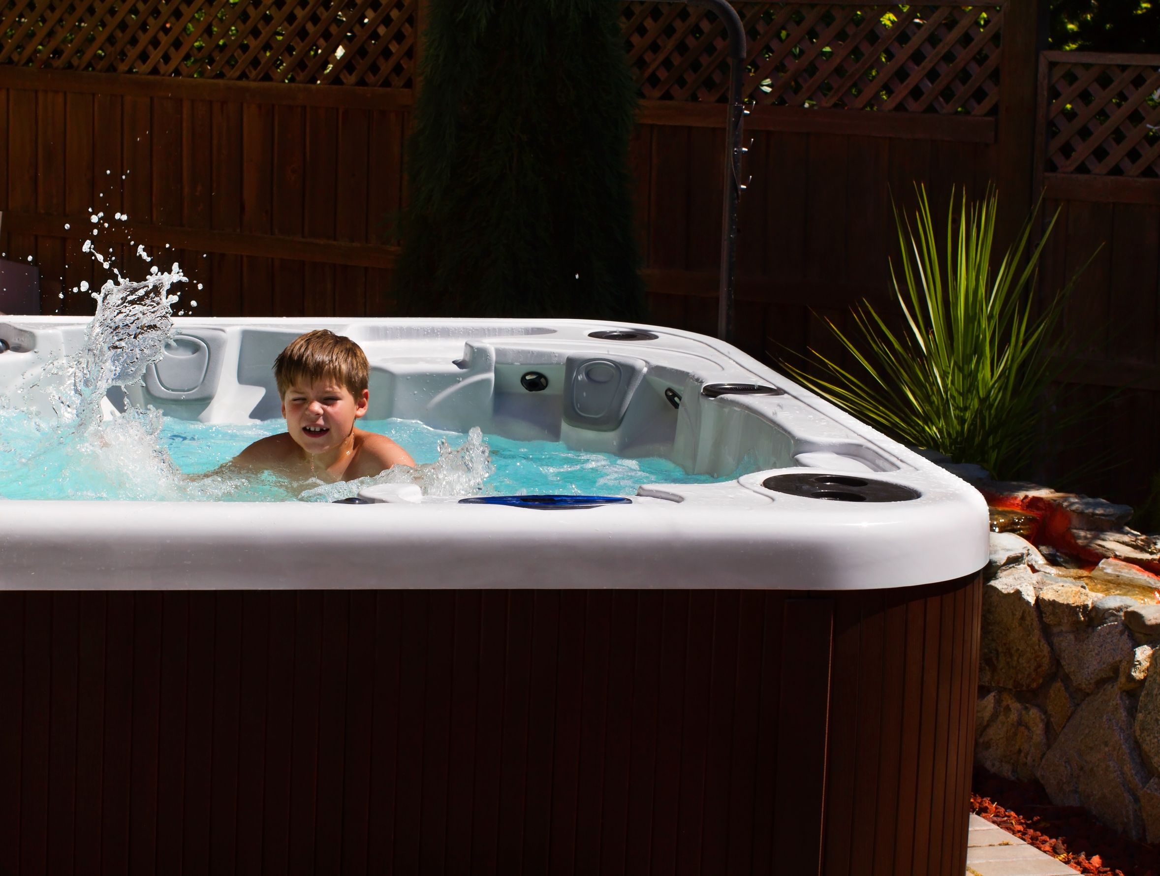 child swimming in a jacuzzi