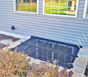74 x 52 Grate with Escape Hatch on Extra Large Wells Black