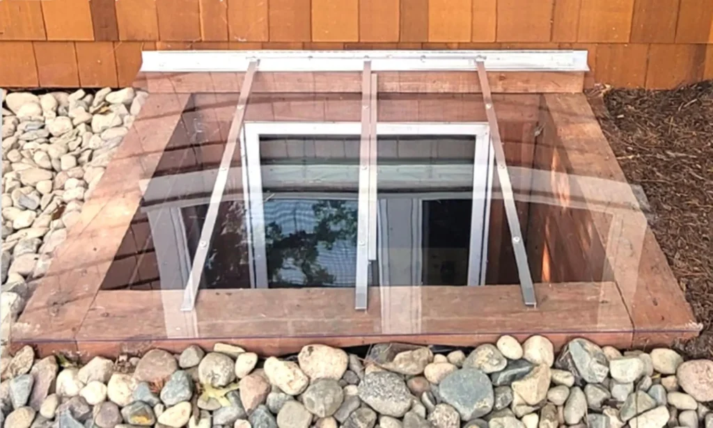 Sloped window well covers