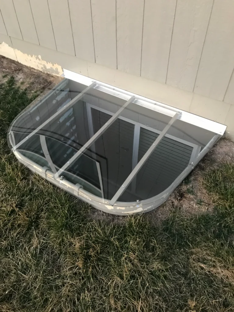 Slopped-window-well-cover
